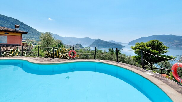 A swimming pool with a view of mountains and a lake. - Room 'Stanza 5' with Mountain View, Wi-Fi and Air Conditioning (Marone)