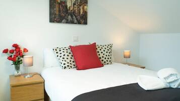 Family Apartment, 4 Bedrooms | Laptop workspace, iron/ironing board, free WiFi