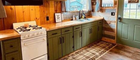 Microwave, stovetop, coffee/tea maker, toaster