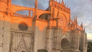 A historic cathedral with Gothic architecture, featuring pointed arches and a large rose window.