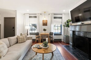 TV, offices - Historic Garden-Level Downtown Apt with Backyard (Savannah)