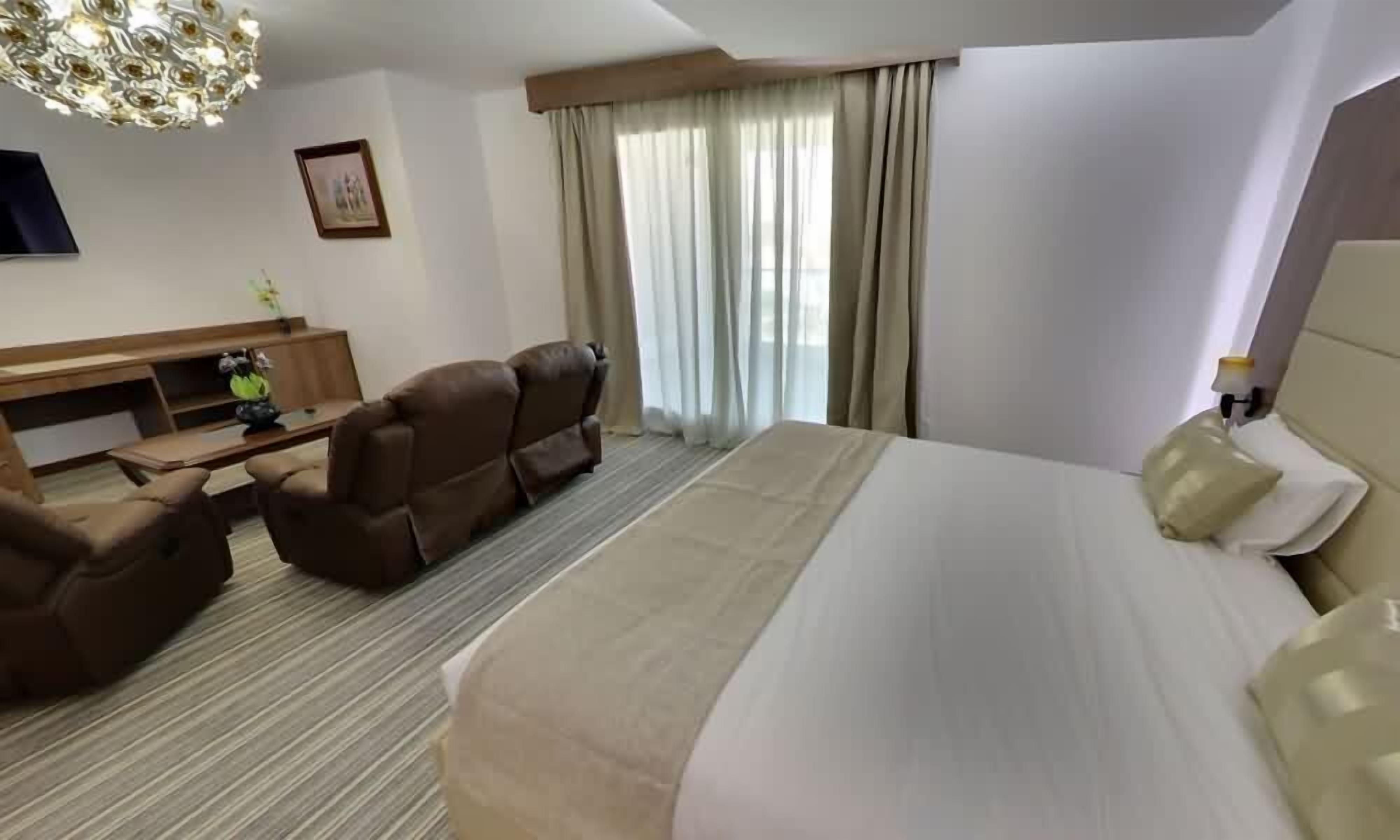 In-room safe, desk, laptop workspace, blackout curtains