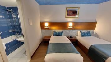 Double or Twin Room | In-room safe, desk, laptop workspace, blackout drapes