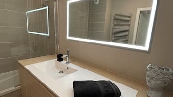 Hair dryer, towels, soap, toilet paper