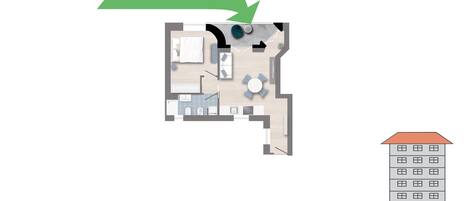 A 2D floor plan of a residential building with a balcony and a first-floor layout.