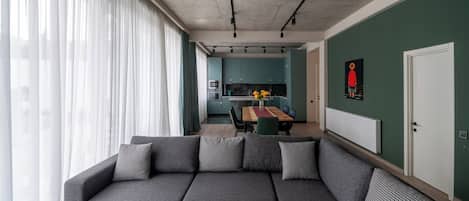 Comfort Apartment, 3 Bedrooms, Lanai, City View | Living area | Flat-screen TV