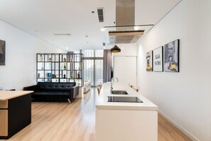 Luxe appartement, 1 kingsize bed, uitzicht op de stad | Woonruimte