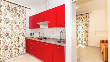 Appartement, vue mer | Cuisine privée