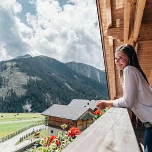 Classic Apartment, Balcony, Mountain View | Living area | TV