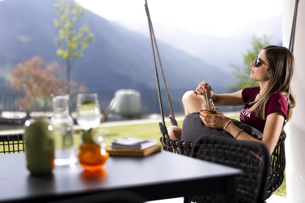 Premium Apartment, Balcony, Mountain View | Living area | TV - Tillga Glück (Obertilliach)