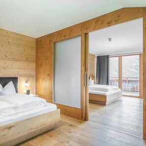 Family Suite, Balcony, Mountain View | In-room safe, desk, laptop workspace, blackout curtains - Tillga Glück (Obertilliach)