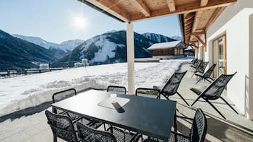 Premium Apartment, Balcony, Mountain View | Living area | TV