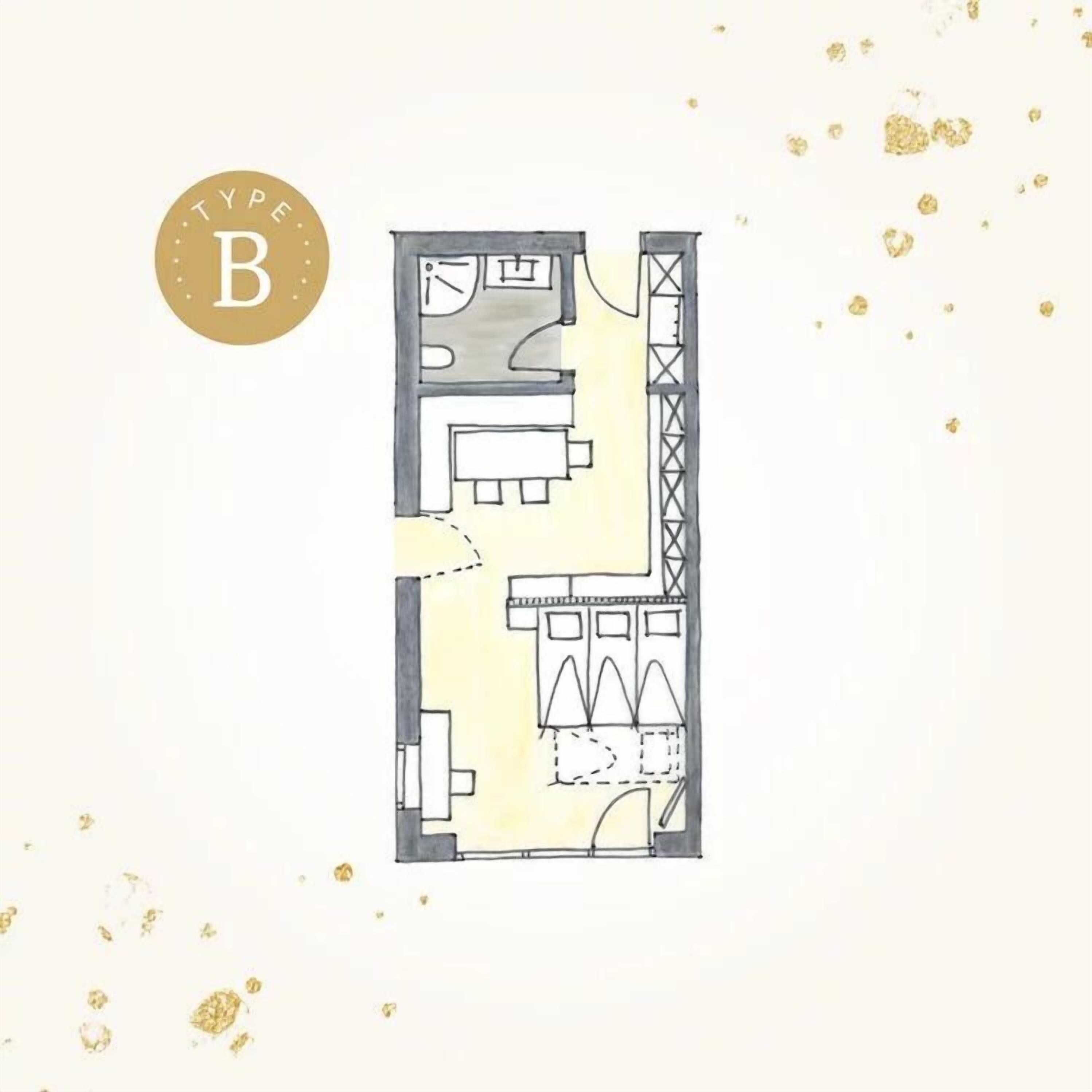 A floor plan of a hotel room with a bed, a desk, a chair, a wardrobe, and a bathroom.