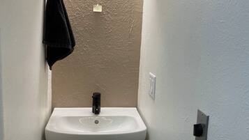 Hair dryer, towels, soap, toilet paper