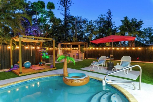 Heated Pool and Spa •  Outdoor Kitchen/Theater/Games
