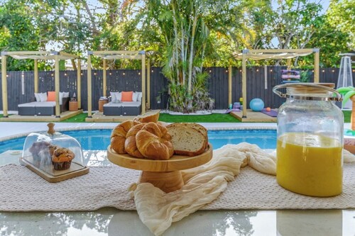 Heated Pool and Spa •  Outdoor Kitchen/Theater/Games