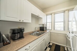 Fridge, microwave, oven, stovetop - Private Gym • 2BR • Modern Condo Downtown (St. Louis)