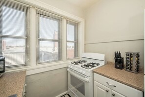Fridge, microwave, oven, stovetop - Private Gym • 2BR • Modern Condo Downtown (St. Louis)