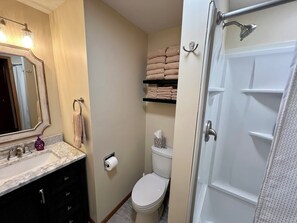 Shower, hair dryer, towels, soap