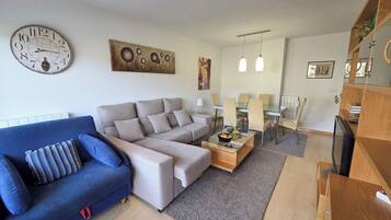 Basic Apartment, 2 Bedrooms | Living area | Flat-screen TV
