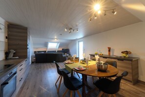 Dining - Gite Le Clocher. Complete apartment overlooking the countryside. (Nassogne)