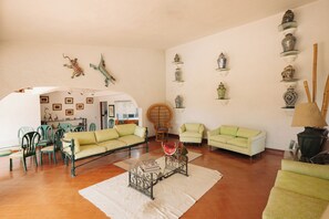 Familienhaus, Veranda, Gartenblick | Wohnbereich