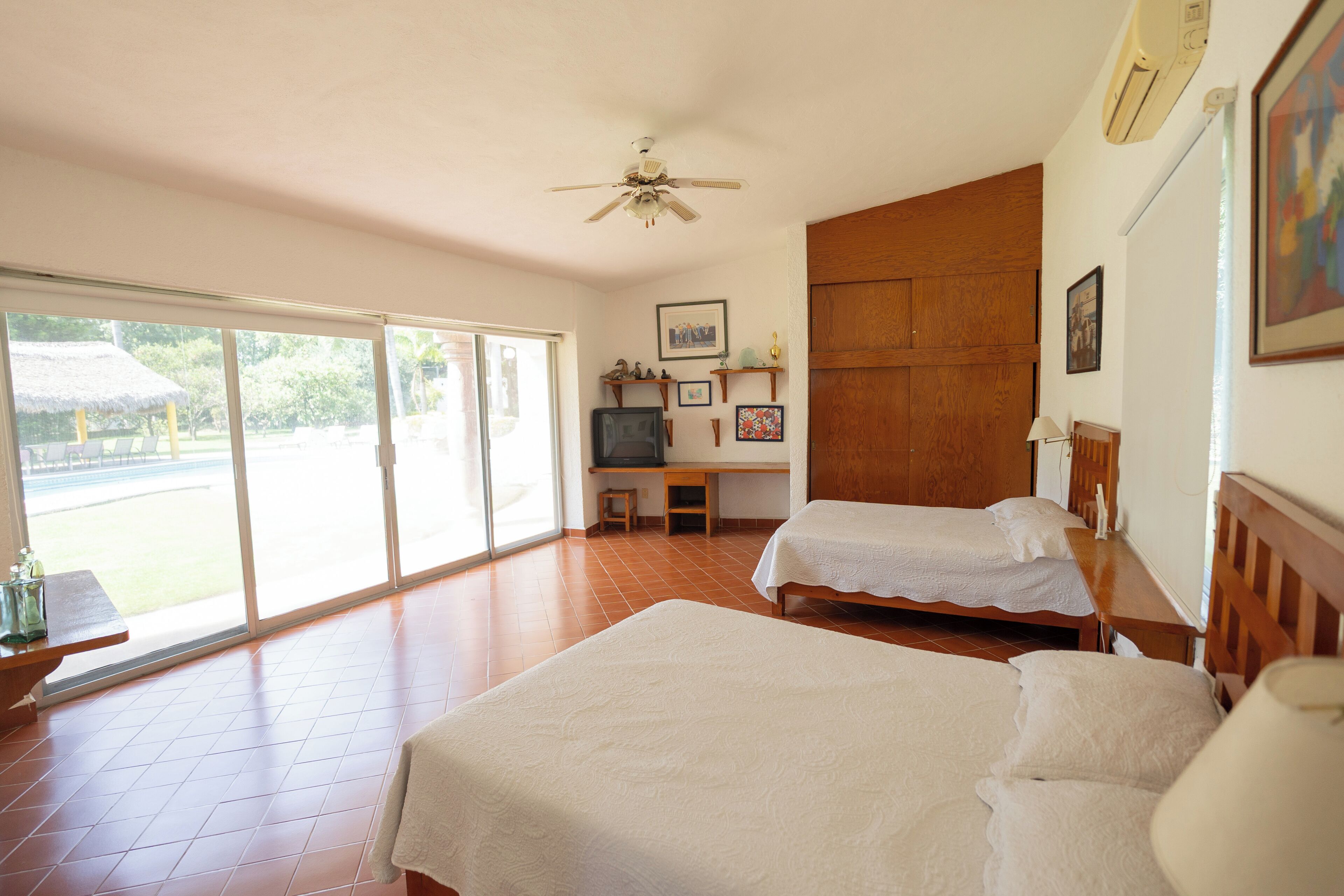 Casa familiare, lanai, vista giardino | Tende oscuranti, ferro/asse da stiro, Wi-Fi gratuito