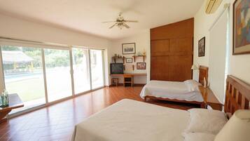 Family House, Lanai, Garden View | Blackout drapes, iron/ironing board, free WiFi