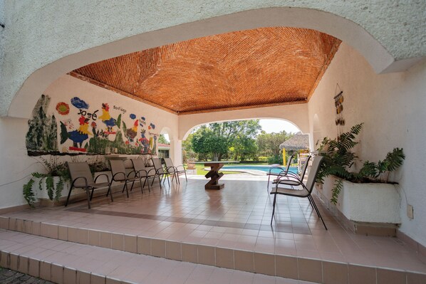 Familienhaus, Veranda, Gartenblick | Wohnbereich