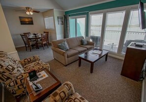 TV, books - Bayside 2BR Condo | Boat Dock, Pool & Beach Fun (Corpus Christi)