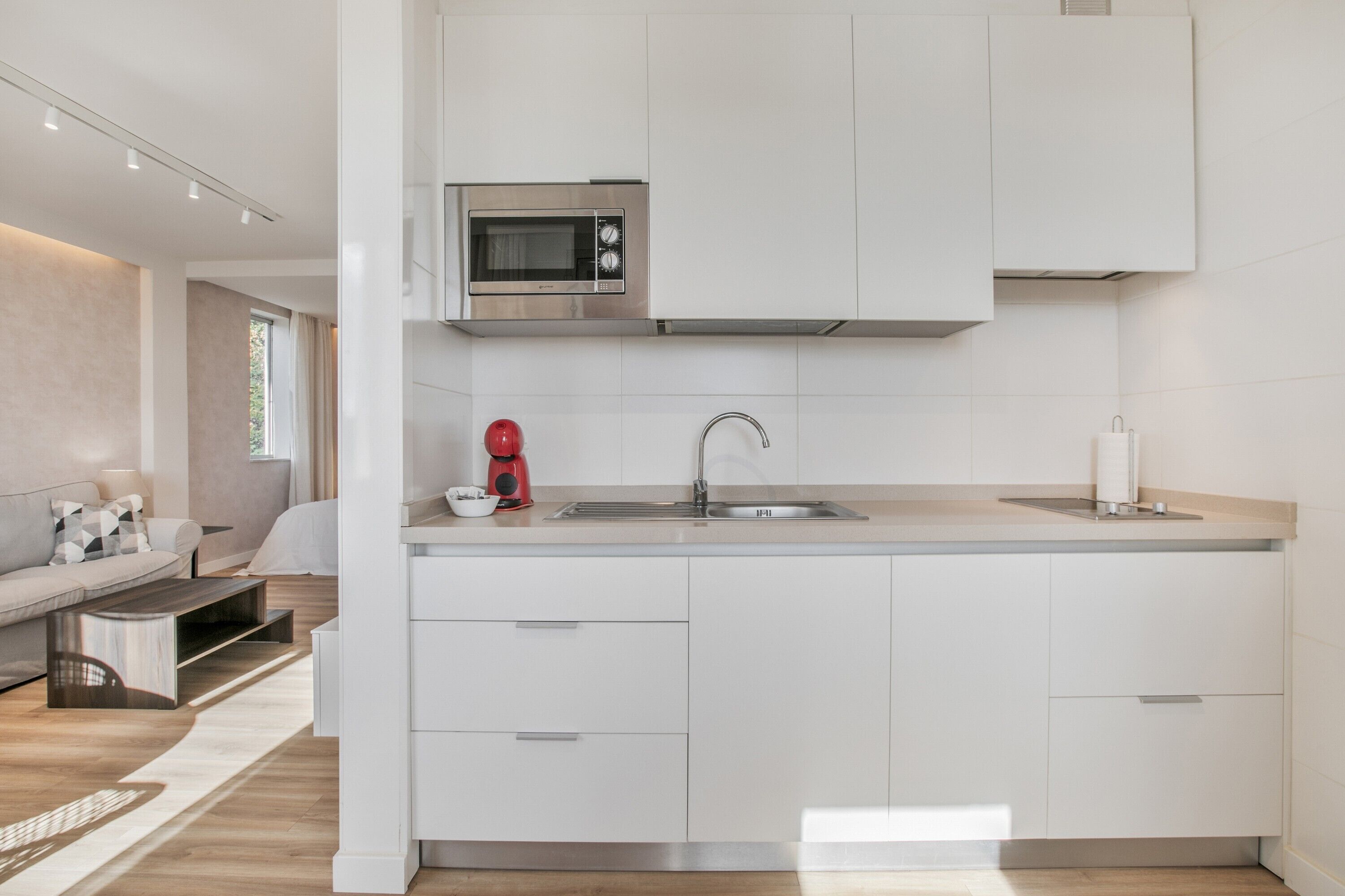 Fridge, microwave, stovetop, coffee/tea maker