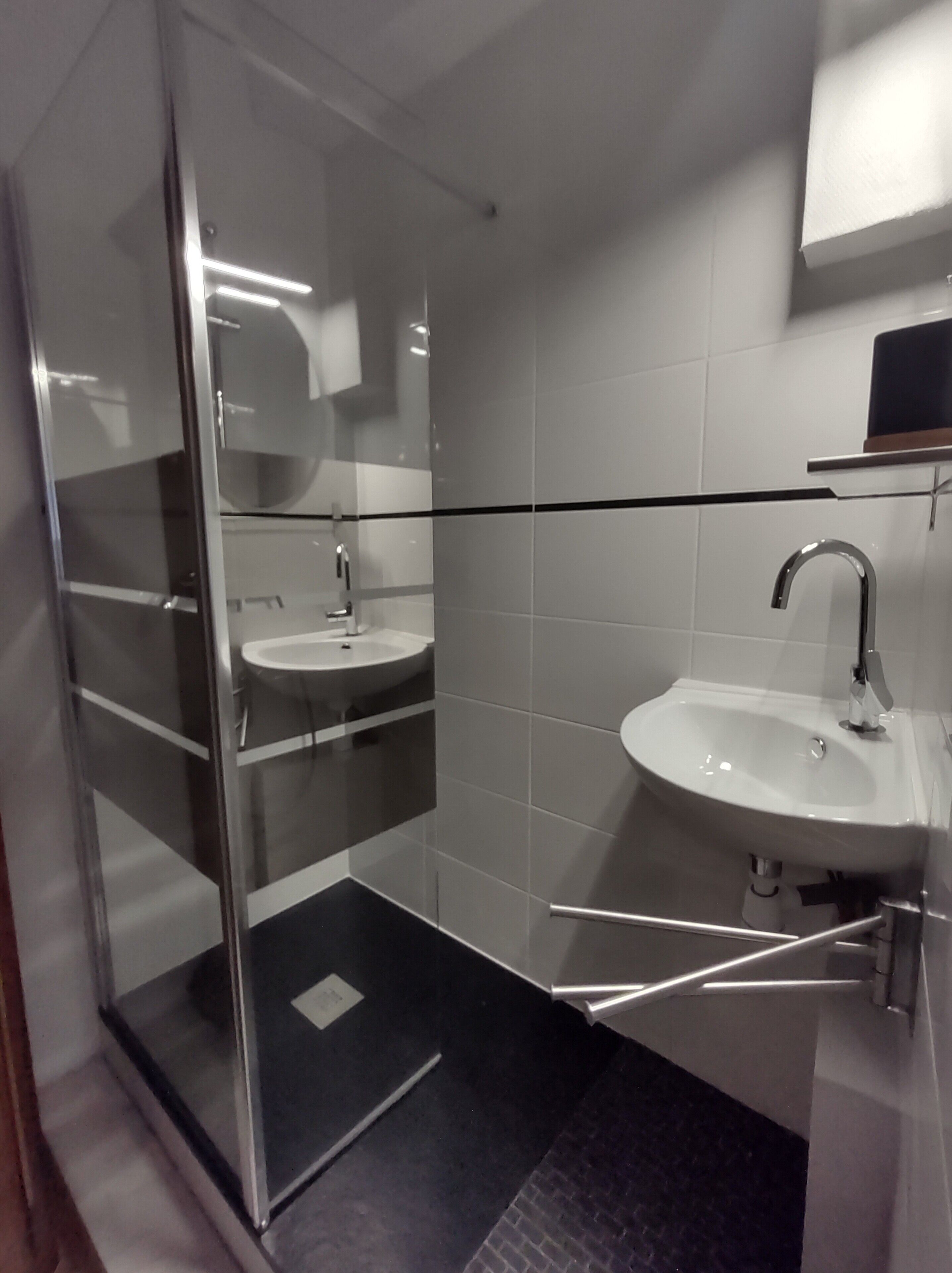 Shower, free toiletries, hair dryer, towels