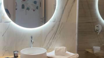 Hair dryer, towels, soap, shampoo