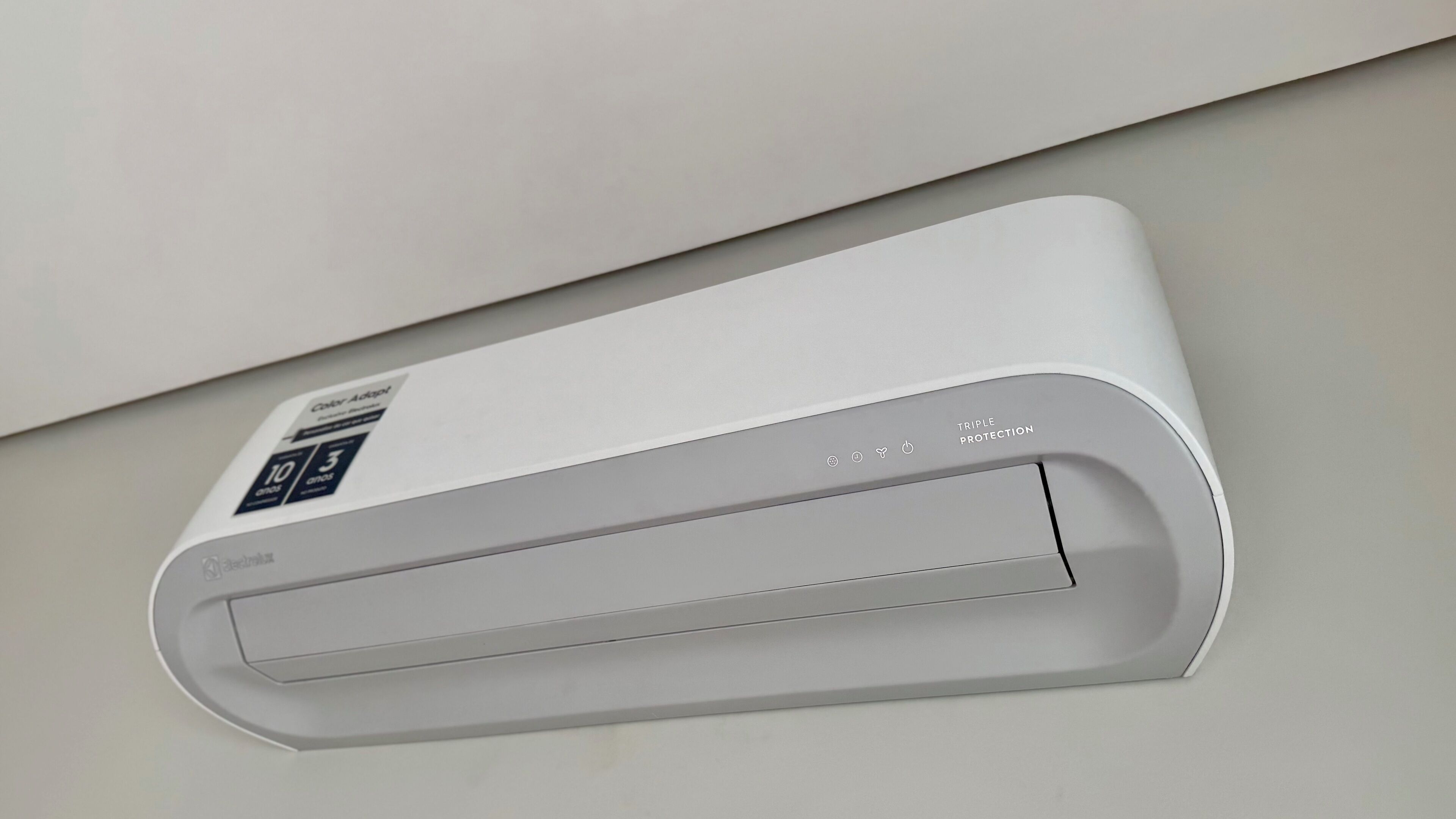 A modern air conditioning unit mounted on a wall.
