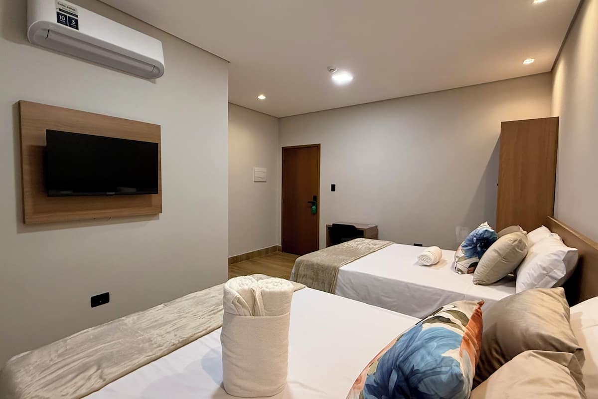 Habitación cuádruple familiar, vistas a la playa | Caja fuerte y wifi gratis