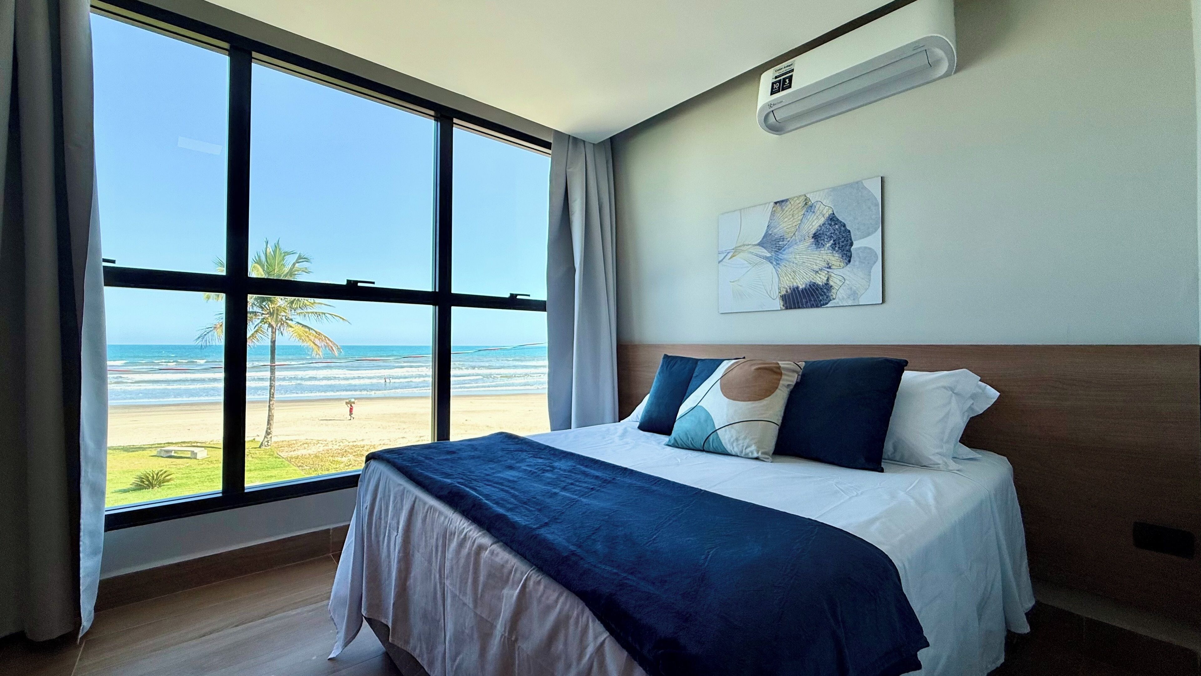 Habitación de lujo, vistas a la playa | Caja fuerte y wifi gratis
