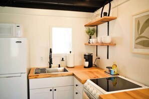 Coffee/tea maker, fridge, microwave, oven - Historic Downtown Caldwell Tiny Home - 1 mi UCA (Conway)