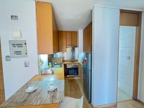 Private kitchen - 8. Apartment with Private Terrace Parking Costanera Center MUT Metro Las Condes (Santiago)