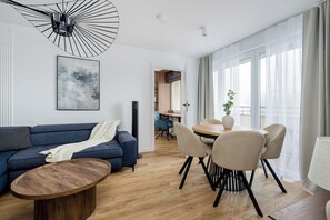 Appartement Deluxe, vue ville | Coin séjour