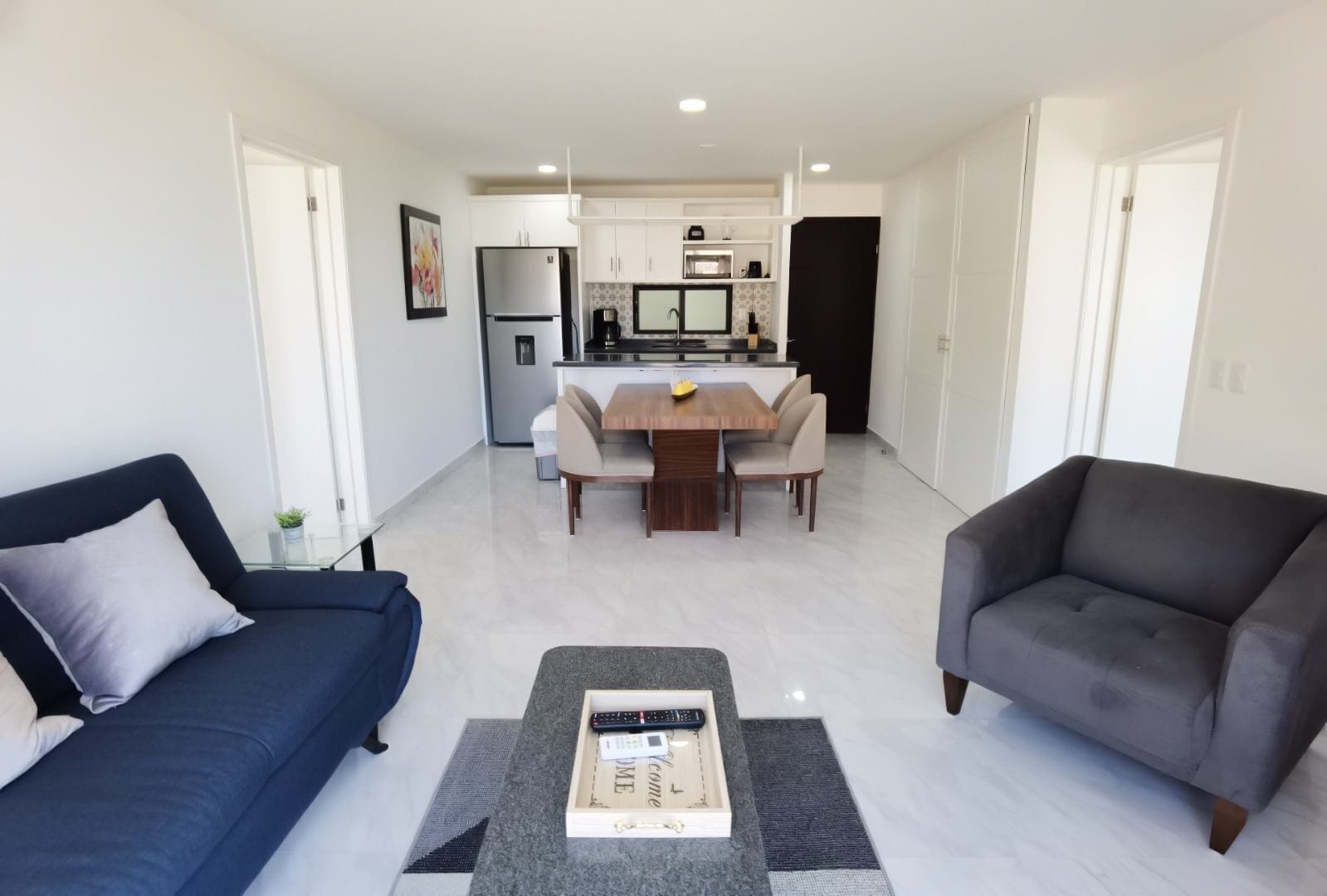 Departamento Deluxe, balcón, vista a la ciudad | Área de sala de estar