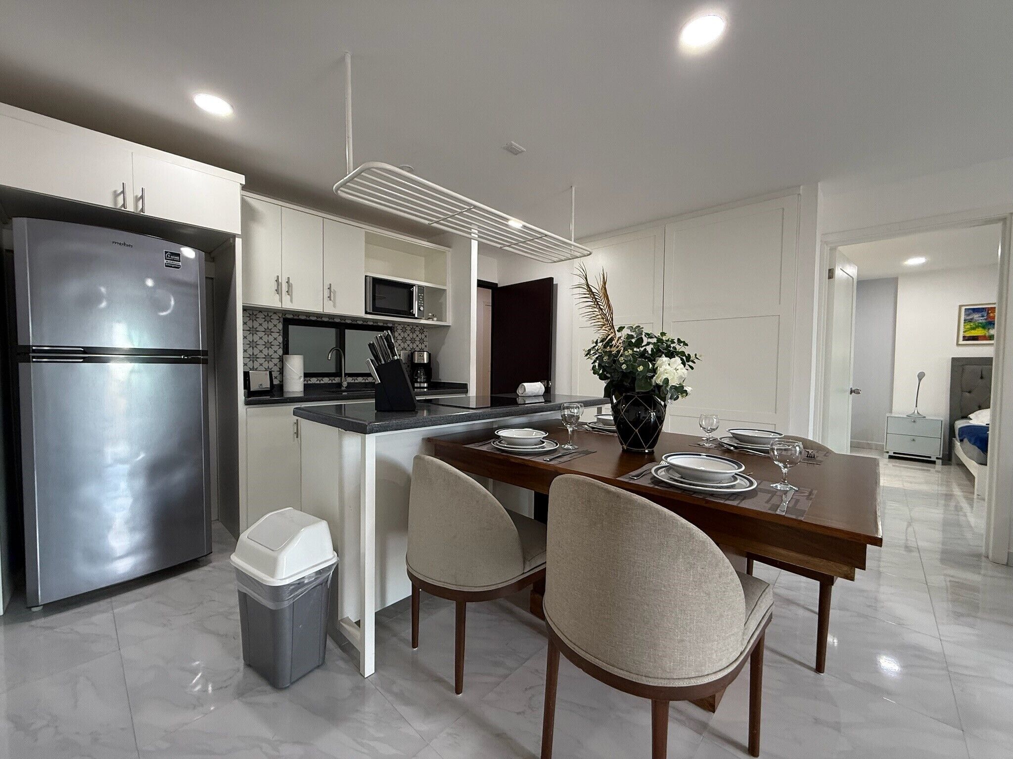 Deluxe Apartment, Balcony, City View | Private kitchen | Microwave, cookware/dishes/utensils