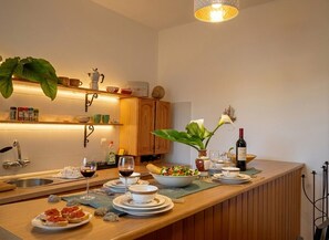 A kitchen with a wooden countertop, a sink, and various kitchen items. - Charming Farmhouse Retreat in Santa Ursula, Tenerife (Santa Ursula)