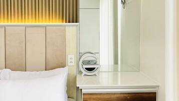 Fer et planche à repasser, draps fournis