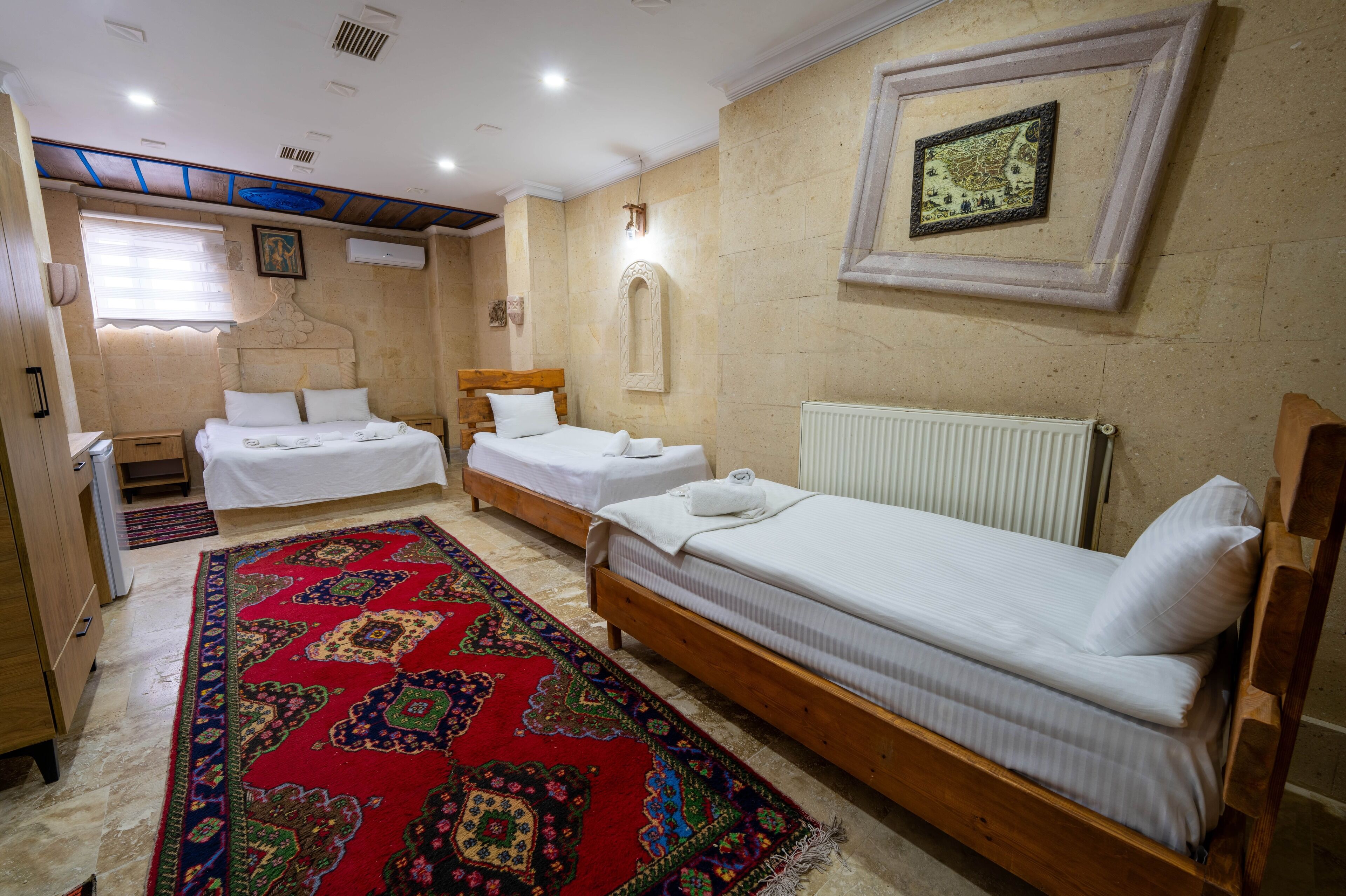 Quadruple Room | Minibar, desk, iron/ironing board, free cribs/infant beds