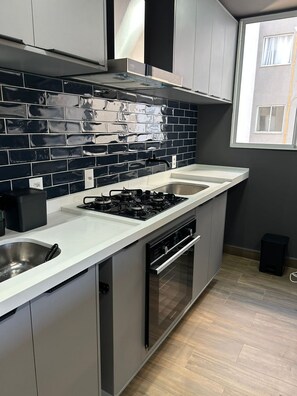 Apartment | Private kitchen | Oven, stovetop, toaster, toaster oven