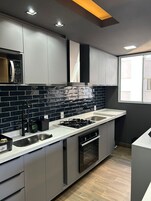 Basic Apartment | Private kitchen | Oven, stovetop, toaster, toaster oven