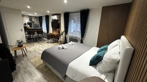 Studio, Balcony, Courtyard View | Minibar, desk, laptop workspace, travel crib - Hotel Blue Garden (Grandvillers)