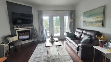 Apartment, 2 Bedrooms, Mountain View | Living area | 50-inch flat-screen TV with cable channels, video-game console