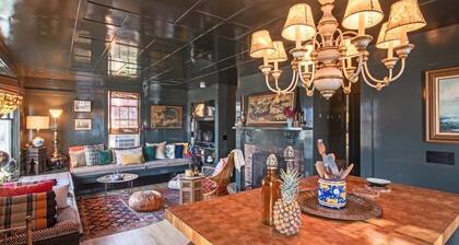 The Explorer’s Retreat • West End Condo, King Bed