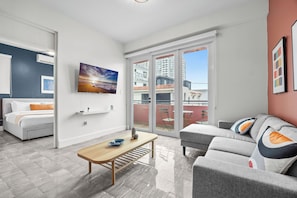 Phòng Suite dành cho gia đình, 4 phòng ngủ, ban công, quang cảnh vườn | Khu phòng khách